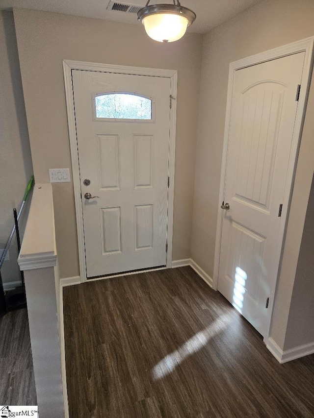 303 Plantation Pt, Anderson, SC 29625 - foyer with dark wood finished floors and baseboards