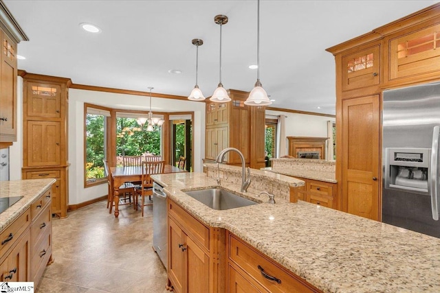 502 Sugar Valley Ct, Greer, SC 29650 - kitchen with stainless steel appliances, ornamental molding, decorative light fixtures, recessed lighting, and light stone countertops