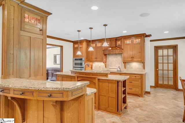502 Sugar Valley Ct, Greer, SC 29650 - kitchen featuring crown molding, decorative backsplash, open shelves, a center island with sink, and recessed lighting