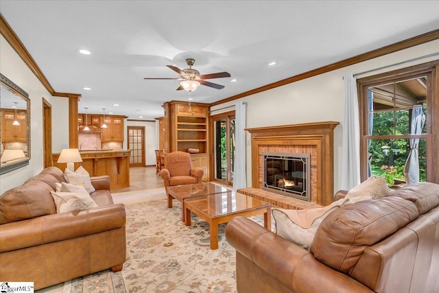 502 Sugar Valley Ct, Greer, SC 29650 - living area featuring recessed lighting, crown molding, a brick fireplace, and a ceiling fan