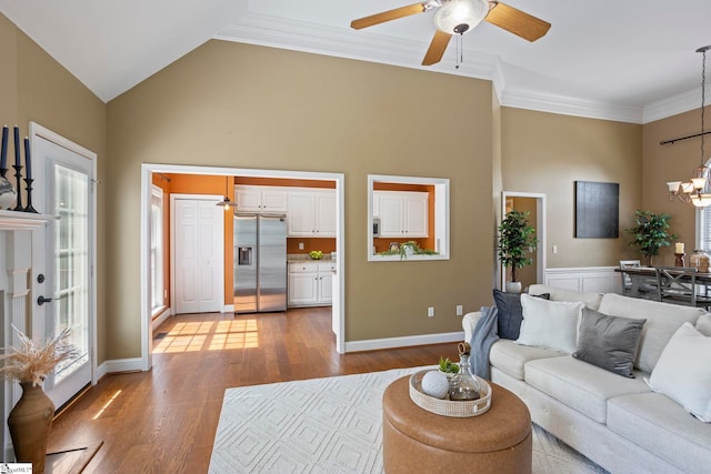 802 Wheat Ct, Greer, SC 29651 - living area featuring a chandelier, wood finished floors, a ceiling fan, high vaulted ceiling, and ornamental molding