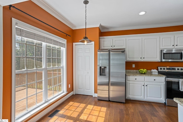 802 Wheat Ct, Greer, SC 29651 - kitchen featuring stainless steel appliances, crown molding, white cabinetry, dark wood-style flooring, and hanging light fixtures