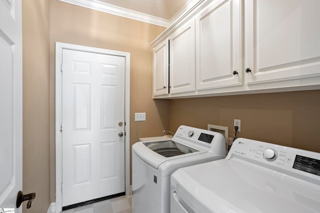 802 Wheat Ct, Greer, SC 29651 - laundry room featuring washer and dryer, cabinet space, and crown molding