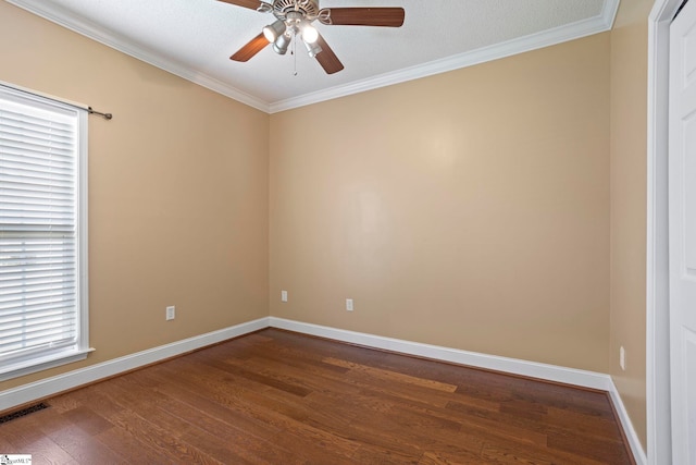 802 Wheat Ct, Greer, SC 29651 - empty room with dark wood finished floors, ceiling fan, and crown molding