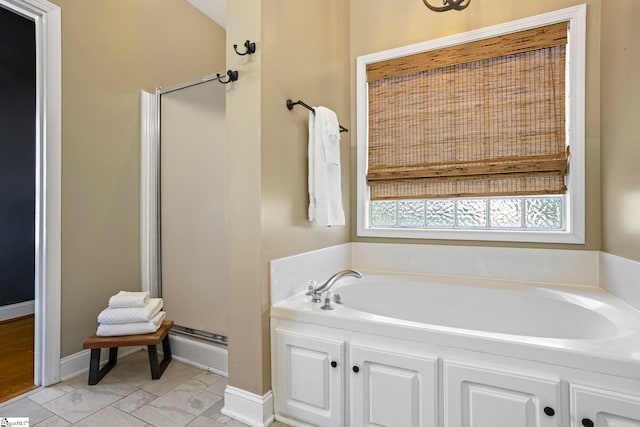 802 Wheat Ct, Greer, SC 29651 - bathroom featuring a garden tub and a stall shower