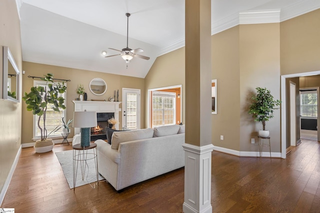 802 Wheat Ct, Greer, SC 29651 - living room with ceiling fan, ornate columns, dark wood-style flooring, a fireplace, and high vaulted ceiling