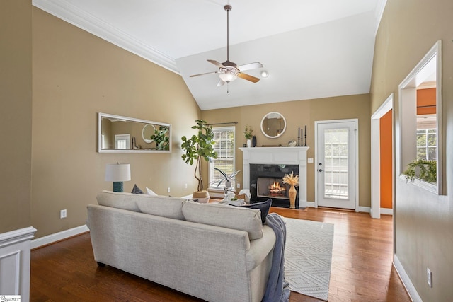 802 Wheat Ct, Greer, SC 29651 - living area with lofted ceiling, a fireplace, a ceiling fan, wood finished floors, and ornamental molding