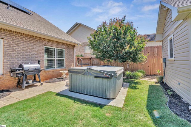 402 Birchbark Ln, Lyman, SC 29365 - fenced backyard featuring a hot tub and a patio area