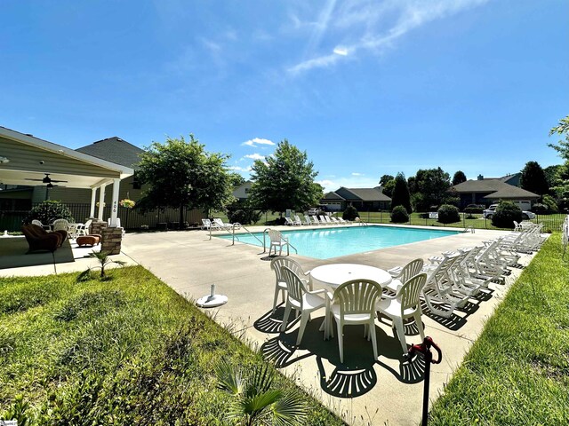 402 Birchbark Ln, Lyman, SC 29365 - community pool with a patio area and a ceiling fan
