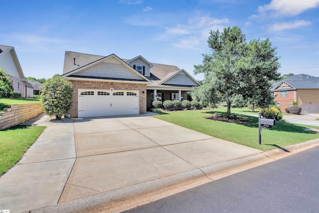 402 Birchbark Ln, Lyman, SC 29365 - craftsman house featuring brick siding, a garage, a front yard, and concrete driveway