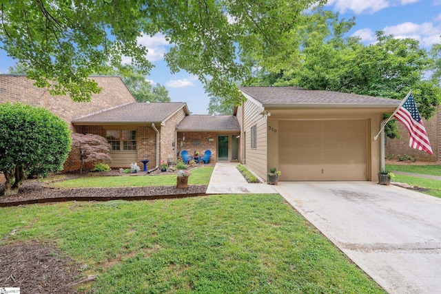 310 Downs Blvd, Clemson, SC 29631 - ranch-style home featuring a garage, concrete driveway, a front lawn, brick siding, and roof with shingles