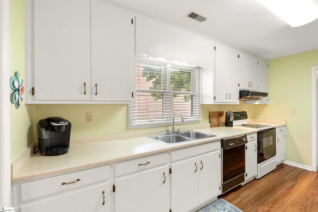 310 Downs Blvd, Clemson, SC 29631 - kitchen featuring black dishwasher, electric stove, white cabinets, under cabinet range hood, and wood finished floors