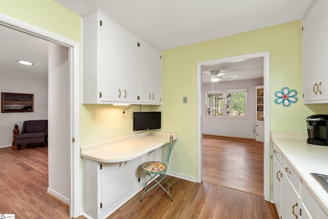 310 Downs Blvd, Clemson, SC 29631 - kitchen featuring light wood-style flooring, white cabinets, and light countertops