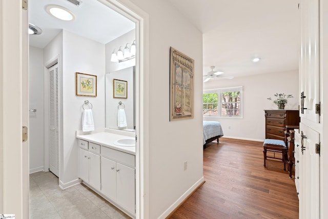 310 Downs Blvd, Clemson, SC 29631 - full bathroom with vanity, ceiling fan, wood finished floors, and ensuite bathroom