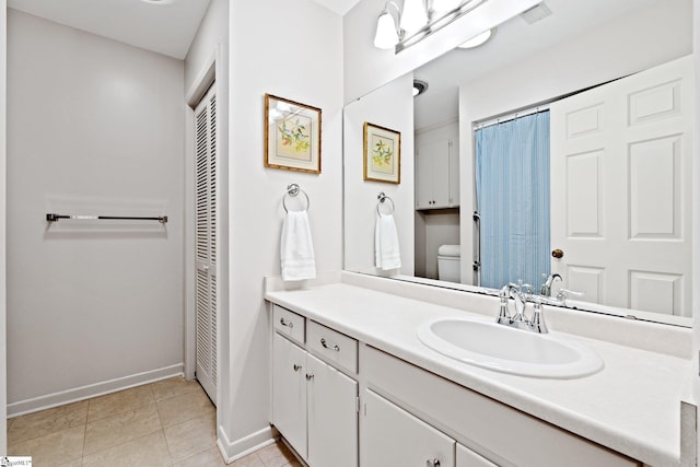 310 Downs Blvd, Clemson, SC 29631 - bathroom featuring a closet, vanity, and tile patterned floors