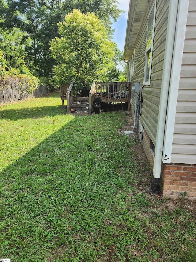 109 Laurens Ct, Fountain Inn, SC 29644 - view of grassy yard with a deck