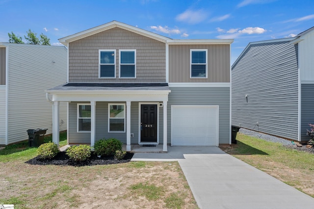 309 Long Grove Ln, Greer, SC 29650 - view of front facade featuring driveway, a porch, and a garage