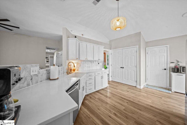 521 Omniwood Ct, Greer, SC 29651 - kitchen featuring ceiling fan, light wood-style floors, backsplash, light countertops, and vaulted ceiling