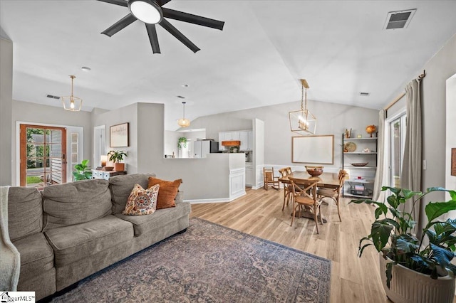 521 Omniwood Ct, Greer, SC 29651 - living room with light wood-style flooring, lofted ceiling, and a ceiling fan