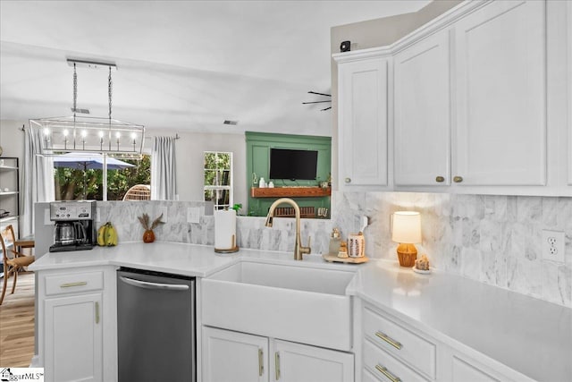 521 Omniwood Ct, Greer, SC 29651 - kitchen featuring dishwasher, tasteful backsplash, white cabinetry, light countertops, and hanging light fixtures