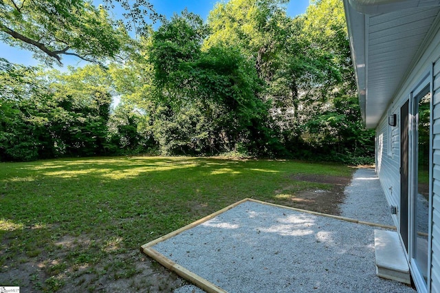 307 Echols St, Greenville, SC 29601 - view of grassy yard with a patio area