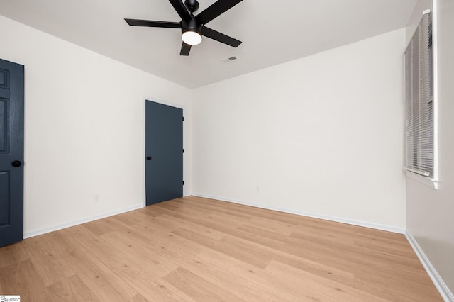 307 Echols St, Greenville, SC 29601 - empty room featuring light wood-style floors and a ceiling fan
