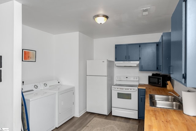 307 Echols St, Greenville, SC 29601 - kitchen featuring white appliances, under cabinet range hood, blue cabinets, washing machine and dryer, and wooden counters