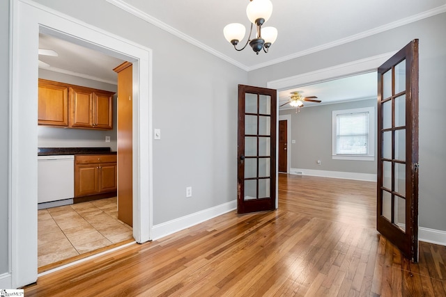 1706 Park Dr, Anderson, SC 29625 - unfurnished dining area with french doors, light wood-style flooring, ornamental molding, and a chandelier