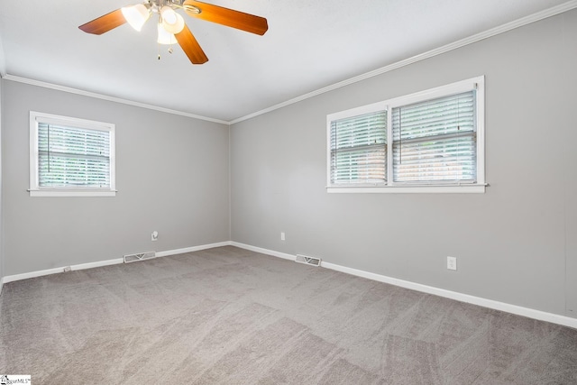 1706 Park Dr, Anderson, SC 29625 - carpeted empty room with crown molding and ceiling fan