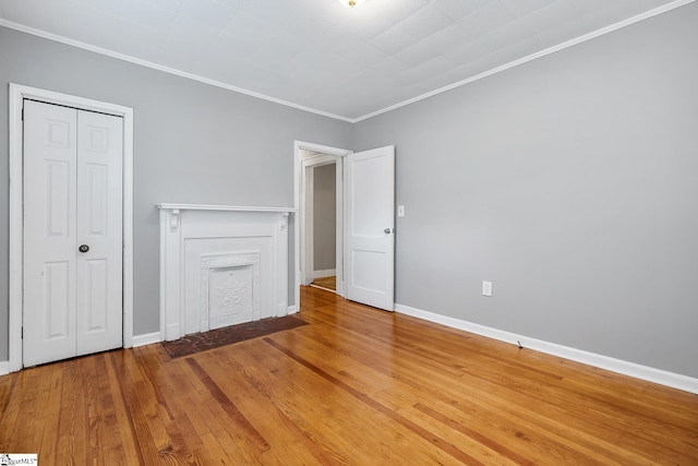 1706 Park Dr, Anderson, SC 29625 - unfurnished bedroom with ornamental molding, wood finished floors, and a closet