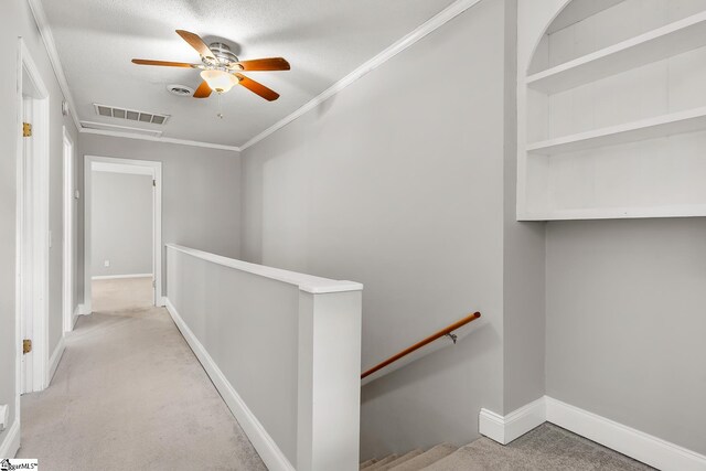 1706 Park Dr, Anderson, SC 29625 - corridor with an upstairs landing, light colored carpet, and crown molding