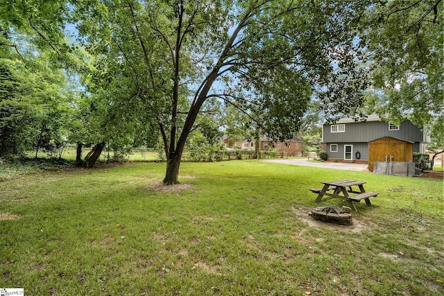 1706 Park Dr, Anderson, SC 29625 - view of grassy yard with an outdoor fire pit