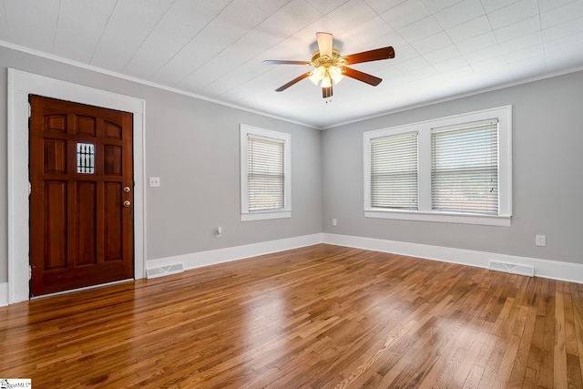 1706 Park Dr, Anderson, SC 29625 - foyer entrance with ceiling fan, wood finished floors, and ornamental molding