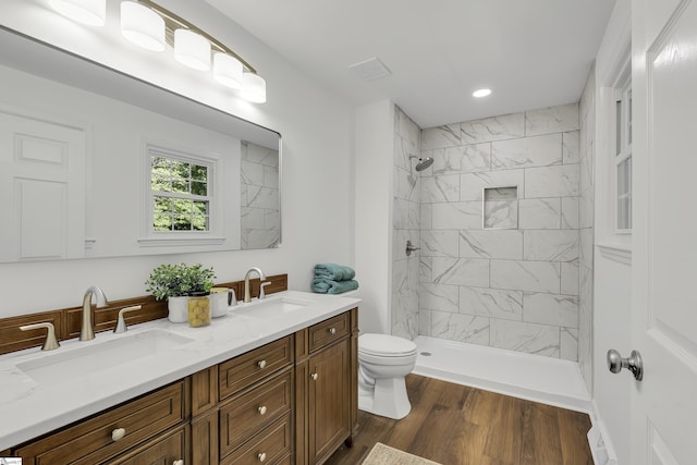 505 E Hackney Rd, Greer, SC 29650 - bathroom featuring double vanity, tiled shower, wood finished floors, and recessed lighting