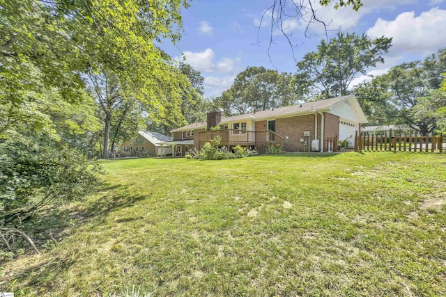 505 E Hackney Rd, Greer, SC 29650 - view of yard featuring an attached garage and a wooden deck