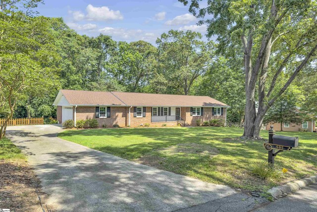 505 E Hackney Rd, Greer, SC 29650 - ranch-style house featuring brick siding, driveway, and a garage