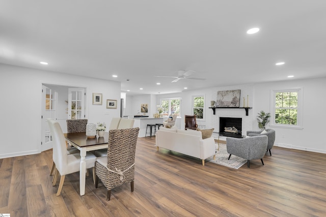 505 E Hackney Rd, Greer, SC 29650 - dining room with recessed lighting, a fireplace, dark wood-style flooring, and ceiling fan