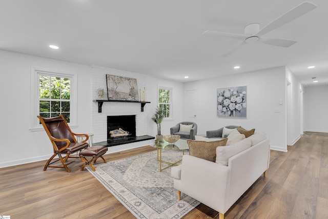 505 E Hackney Rd, Greer, SC 29650 - living area with wood finished floors, a brick fireplace, recessed lighting, and a ceiling fan