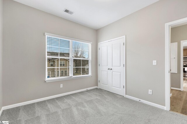 463 Lynnell Way, Moore, SC 29369 - unfurnished bedroom featuring carpet floors and a closet
