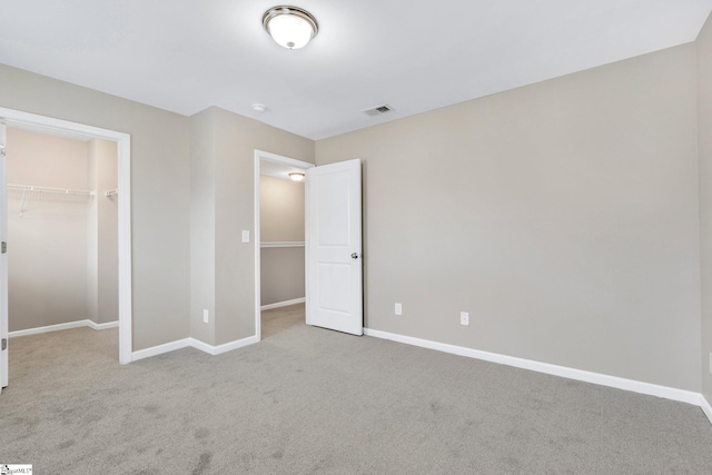 463 Lynnell Way, Moore, SC 29369 - unfurnished bedroom featuring carpet floors, a spacious closet, and a closet