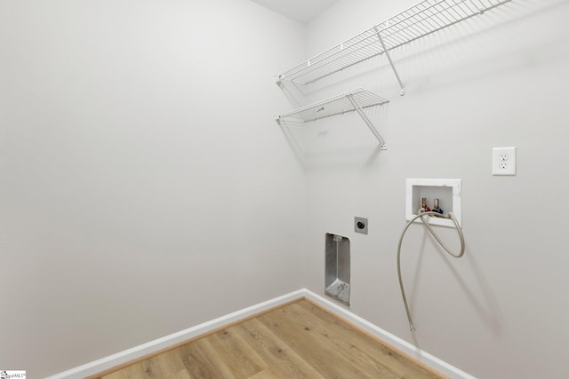 463 Lynnell Way, Moore, SC 29369 - washroom with hookup for an electric dryer, light wood finished floors, and hookup for a washing machine