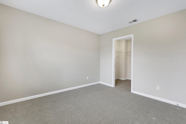463 Lynnell Way, Moore, SC 29369 - unfurnished bedroom with carpet, a walk in closet, and a closet