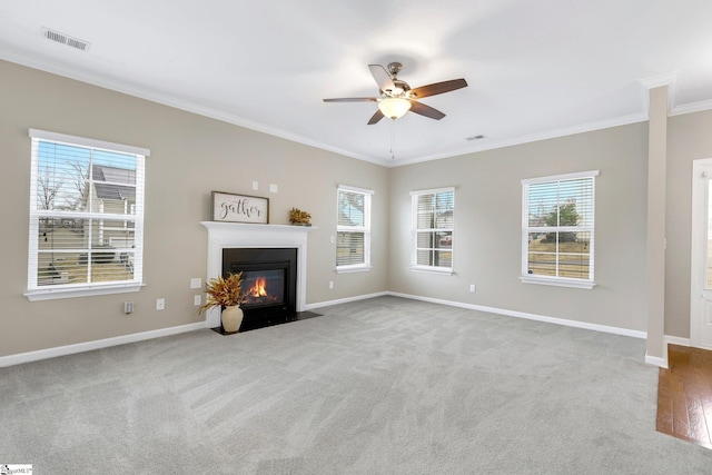 463 Lynnell Way, Moore, SC 29369 - unfurnished living room with ornamental molding, a ceiling fan, a fireplace with flush hearth, and carpet flooring