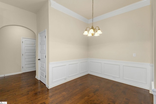 27 Dandie Dr, Simpsonville, SC 29680 - empty room featuring a wainscoted wall, crown molding, a chandelier, and dark wood-style flooring