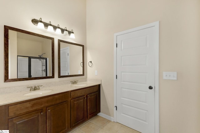 27 Dandie Dr, Simpsonville, SC 29680 - full bath featuring double vanity, a shower with door, and tile patterned floors