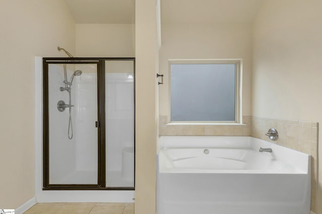 27 Dandie Dr, Simpsonville, SC 29680 - full bathroom featuring a shower stall, a bath, and tile patterned floors