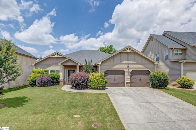 27 Dandie Dr, Simpsonville, SC 29680 - craftsman-style house with an attached garage, a front lawn, board and batten siding, and driveway