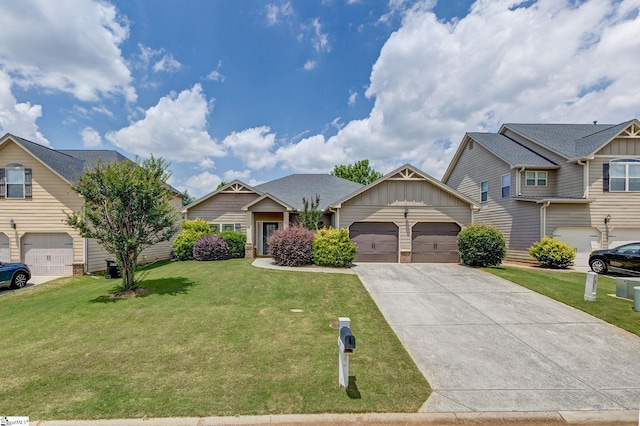 27 Dandie Dr, Simpsonville, SC 29680 - craftsman inspired home with concrete driveway, a garage, a front lawn, and board and batten siding
