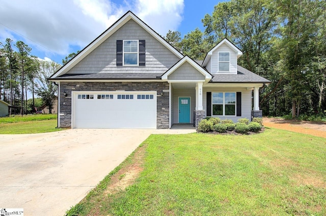 918 Belton Hwy, Williamston, SC 29691 - craftsman-style house with a front lawn, stone siding, a garage, and driveway
