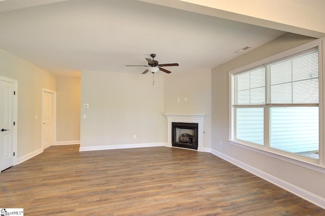 918 Belton Hwy, Williamston, SC 29691 - unfurnished living room featuring a ceiling fan, dark wood-style floors, and a fireplace